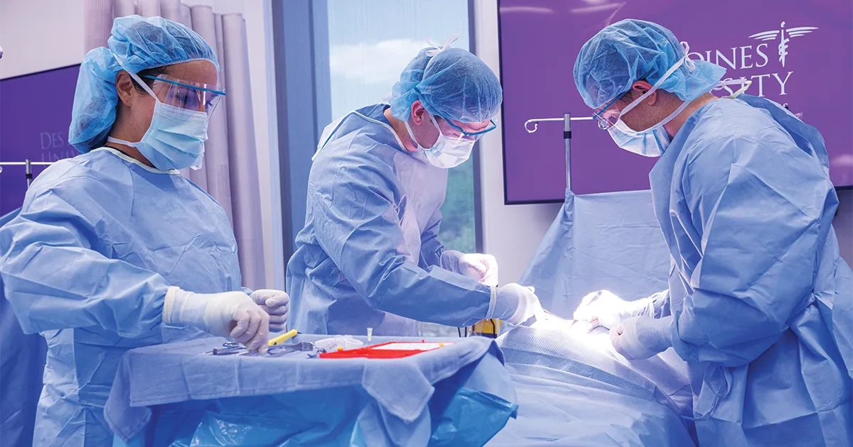 DMU students participate in a surgical simulation.