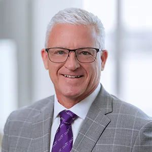 Headshot of Kevin Smith, Dean for the College of Podiatric Medicine and Surgery.