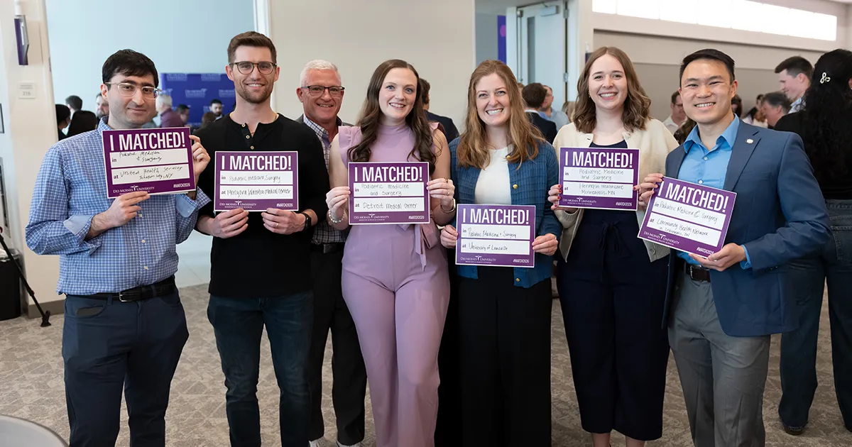DMU College of Podiatric Medicine and Surgery students pose for a group photo on Match Day to celebrate residency matches.