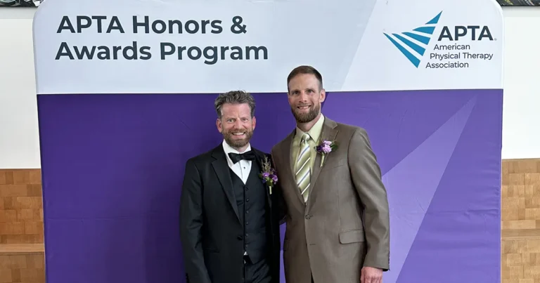 Shane McClinton, PT, DPT, PhD, poses for a photo with Kyle Covington, PT, DPT, PhD, president of the American Physical Therapy Association.