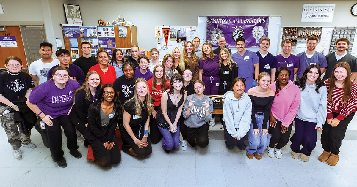 DMU Anatomy Ambassadors pose with anatomy students during a classroom visit at Ankeny Centennial High School.