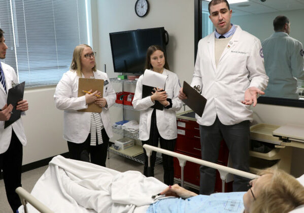 First-year DO, PA, DPM, DPT, MHA and MPH students participate in Interprofessional education in the simulation center involving rural emergency room diabetic fall cases Friday, January 31, 2020. (DMU photo by Brett T. Roseman)