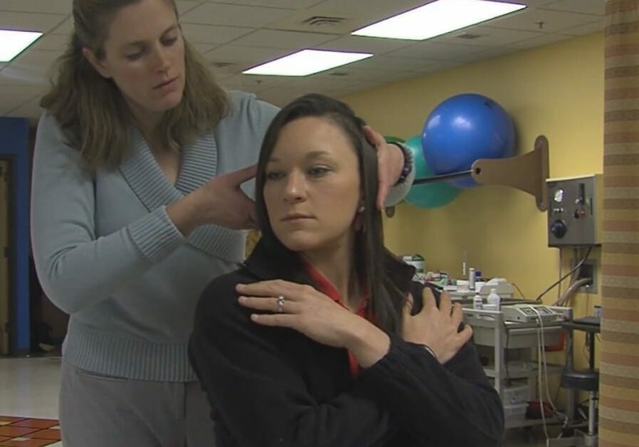 Michelle Brown, M.S.P.T., performs the Epley maneuver on a patient with BPPV.