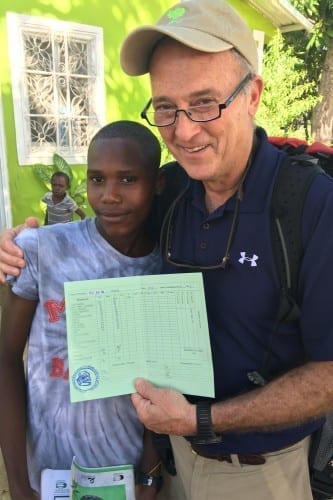 The students of La Concorde love to share their academic achievements and school work with Rick Wilkerson.